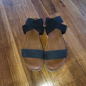 FRANCO SARTO Parton Snake Embossed Platform Sandal in black.